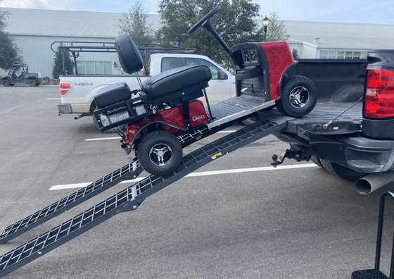 cricket-golf-cart-in-truck-bed-loading-with-loading-ramps
